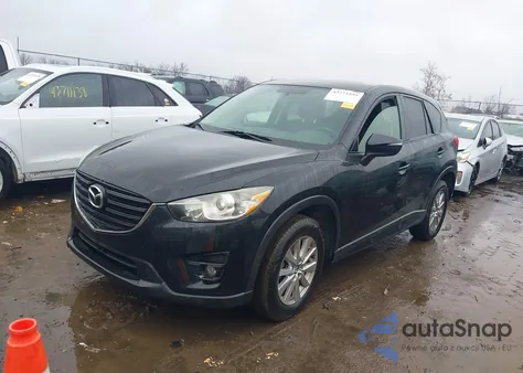 2016 Mazda Cx-5 Touring z USA, uszkodzony, nr VIN JM3KE2CY1G0659830